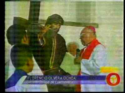 Bishop of Cuernavaca with statue of Jesus