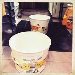 Buckets catching drips from our ceiling.