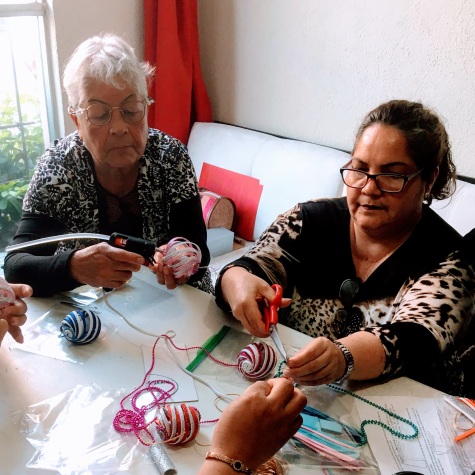 Two women making their ornaments