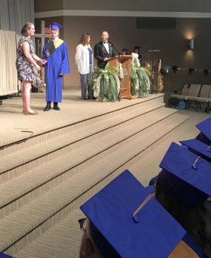 Nathanael receives his diploma