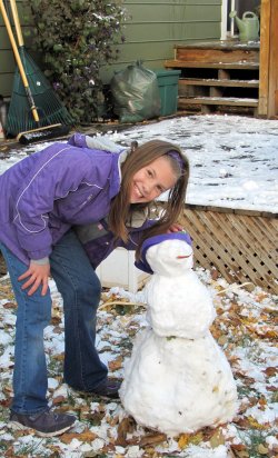 Hannah and her snowman